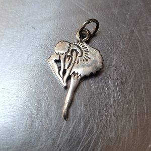 Ballerina putting on point shoe pendant, Sterling silver